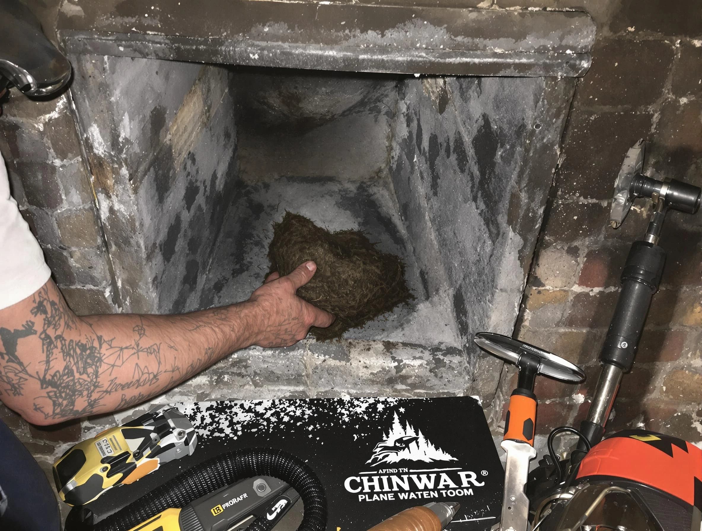 Galloway Chimney Sweep safely removing debris and screening chimney in Galloway, NJ